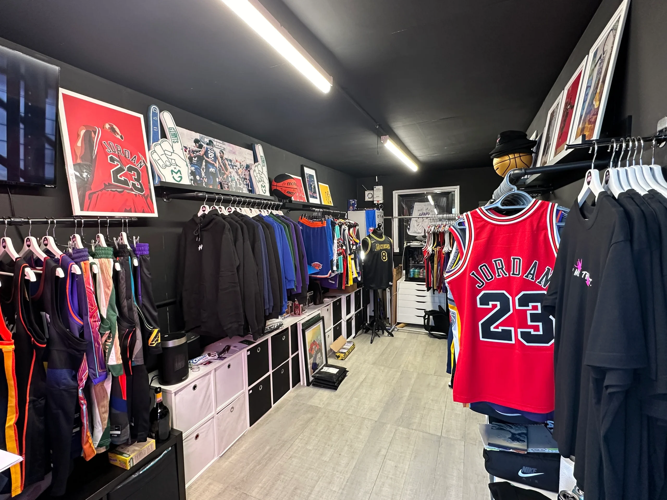 Athlete shopping for basketball gear in sporting goods store