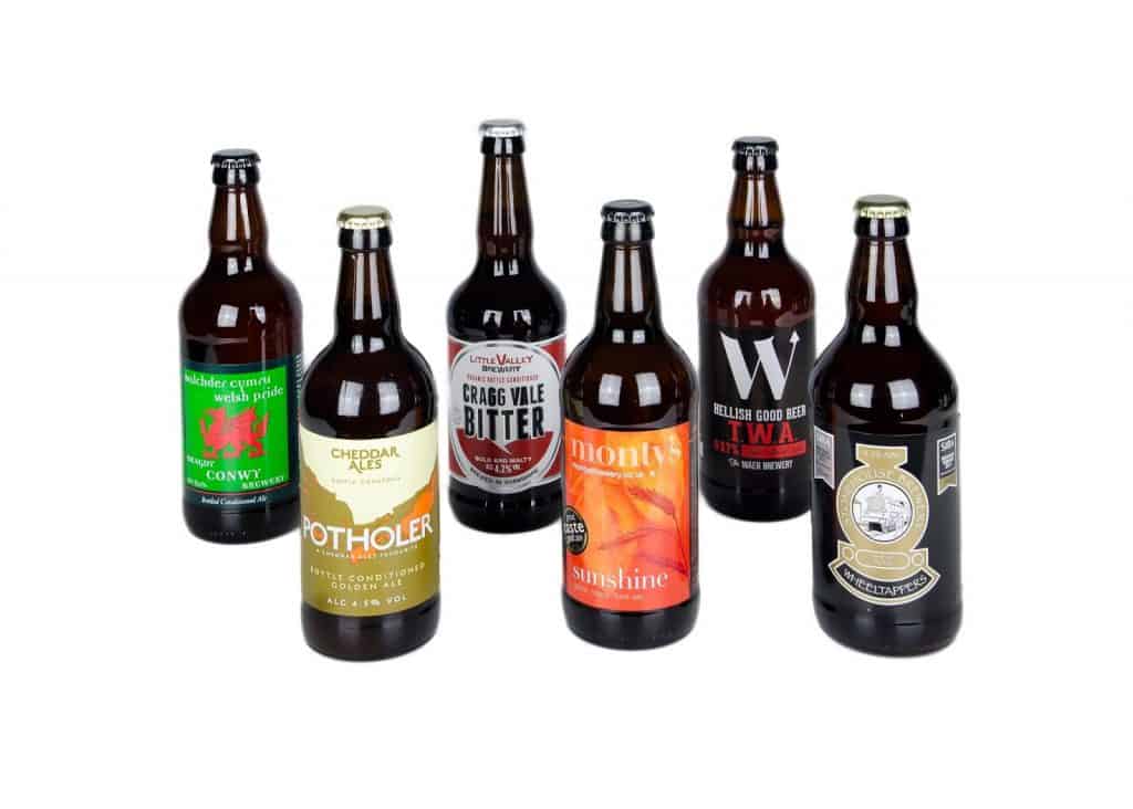 Mix and match six pack of craft beer bottles on counter